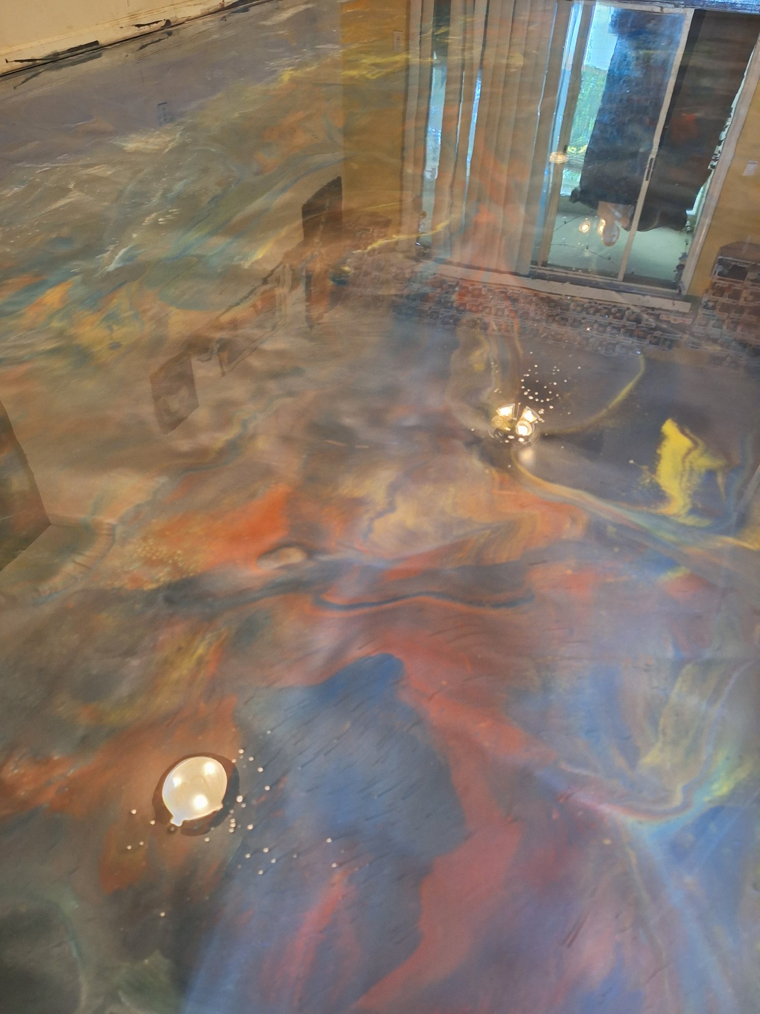 Multi-color galaxy metallic floor in a restaurant interior